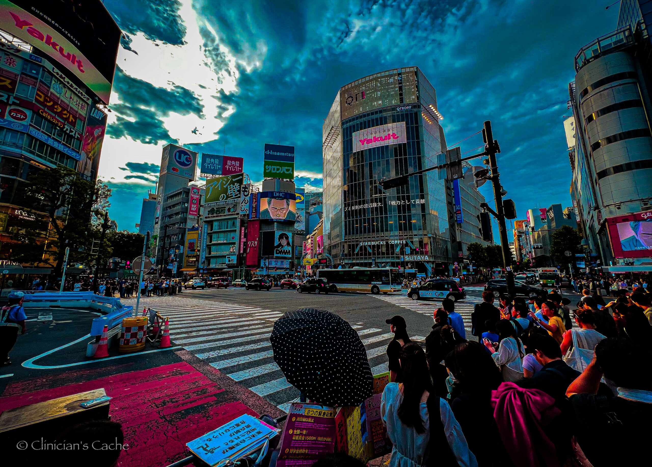 Shibuya Crossing in Tokyo, Japan, bustling with people under a vibrant sky filled with dramatic clouds, surrounded by towering buildings and colorful advertisements