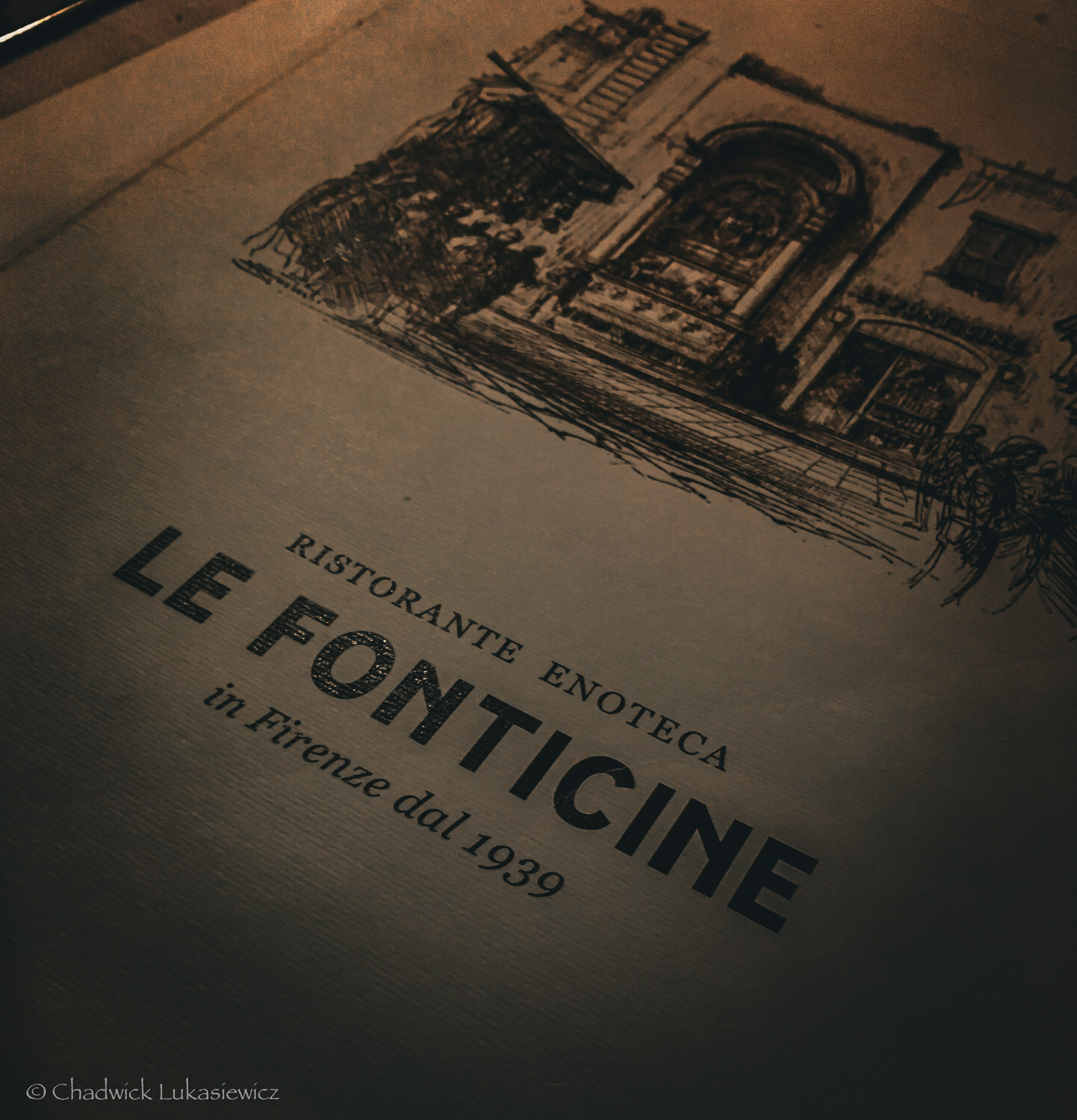 The cover of the menu for Ristorante Enoteca Le Fonticine in Florence, Italy, featuring an elegant sketch of the restaurant’s facade and the text “Le Fonticine in Firenze dal 1939.