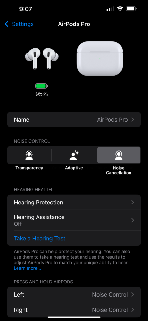 Apple iPhone settings screen showing AirPods Pro settings. The options include microphone settings set to ‘Automatic,’ head gestures toggled ‘On,’ and battery optimization features such as ‘Optimized Battery Charging’ turned on. The ‘Find My Network’ feature is also enabled, with additional settings for ear tip fit tests and off-listening mode.