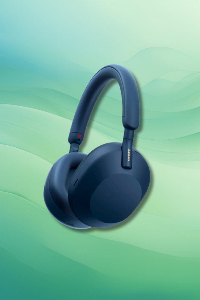 “Blue Sony WH-1000XM5 headphones floating against a soft green gradient background, showcasing their sleek and modern design