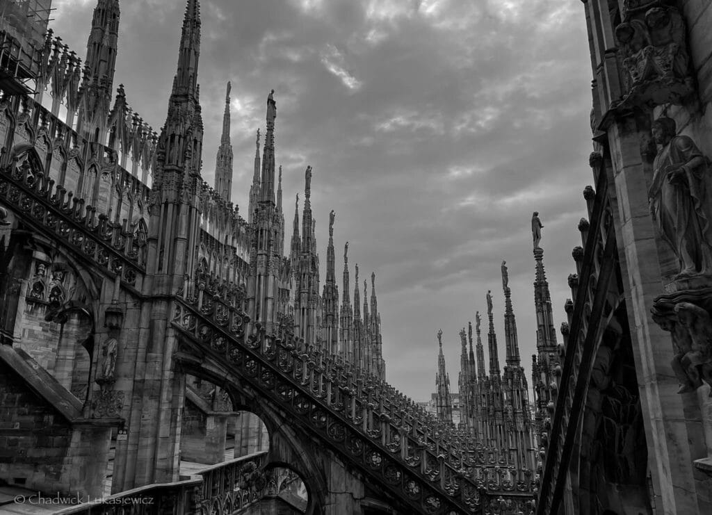 A black-and-white image of the Duomo di Milano’s gothic spires, showcasing the ADHD photographer’s strength in pattern recognition and visual storytelling.
